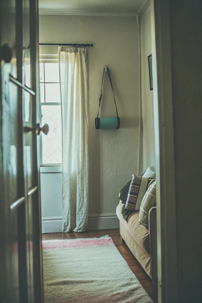 an-artsy-small-apartment-living-room-with-a-blush-